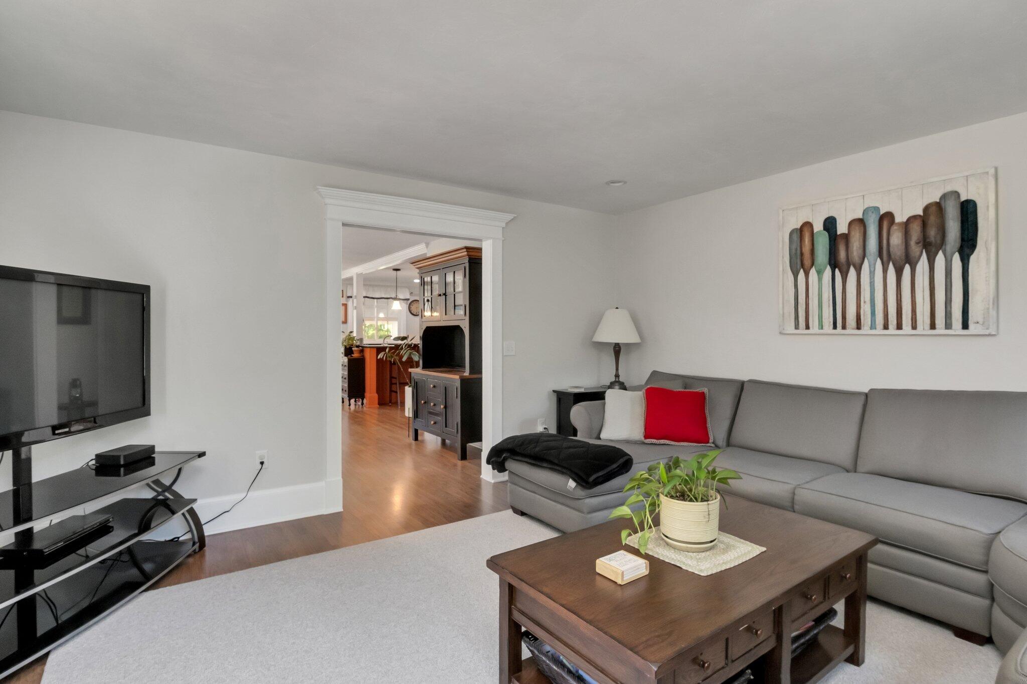 730 Slough Road Brewster, MA 02631 - Photo 32 of 87 a living room with furniture and a flat screen tv