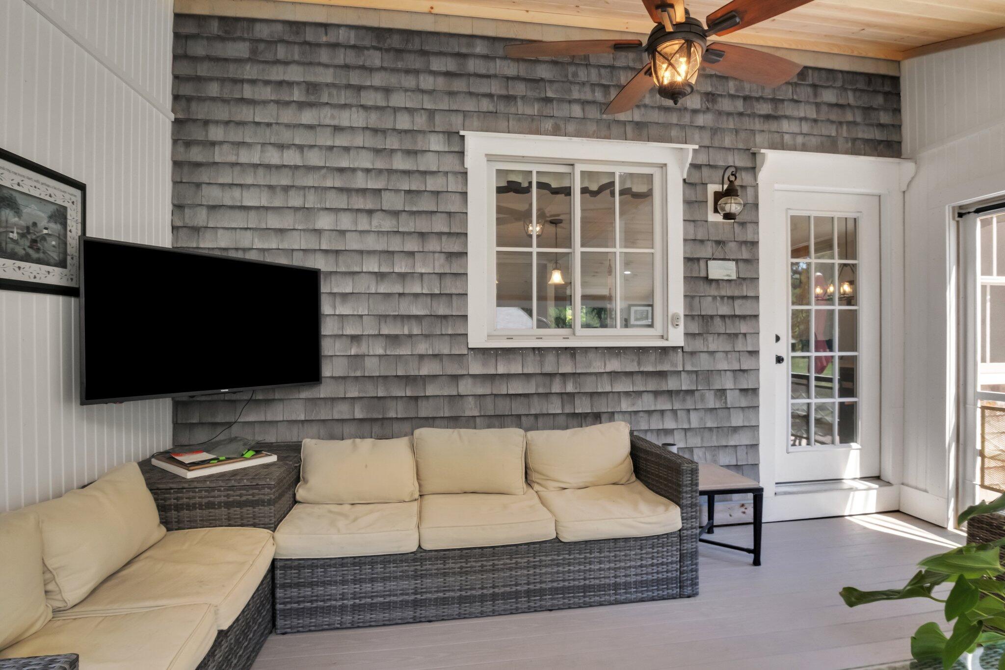 730 Slough Road Brewster, MA 02631 - Photo 36 of 87 a building outdoor space with patio furniture