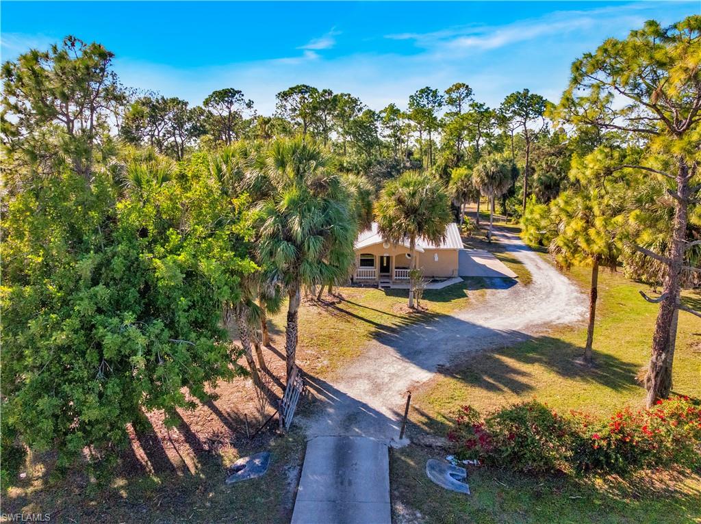 1867 17th Street Southwest Naples, FL 34117 - Photo 26 of 31 View of property's community featuring driveway