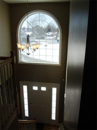 63 Lippold Street Methuen, MA 01844 - Photo 2 of 12 a front view of a house with wooden floor and a floor to ceiling window
