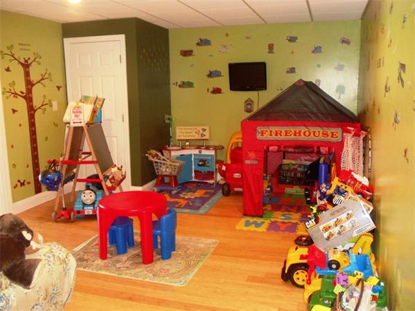 63 Lippold Street Methuen, MA 01844 - Photo 9 of 12 a living room with furniture and a flat screen tv