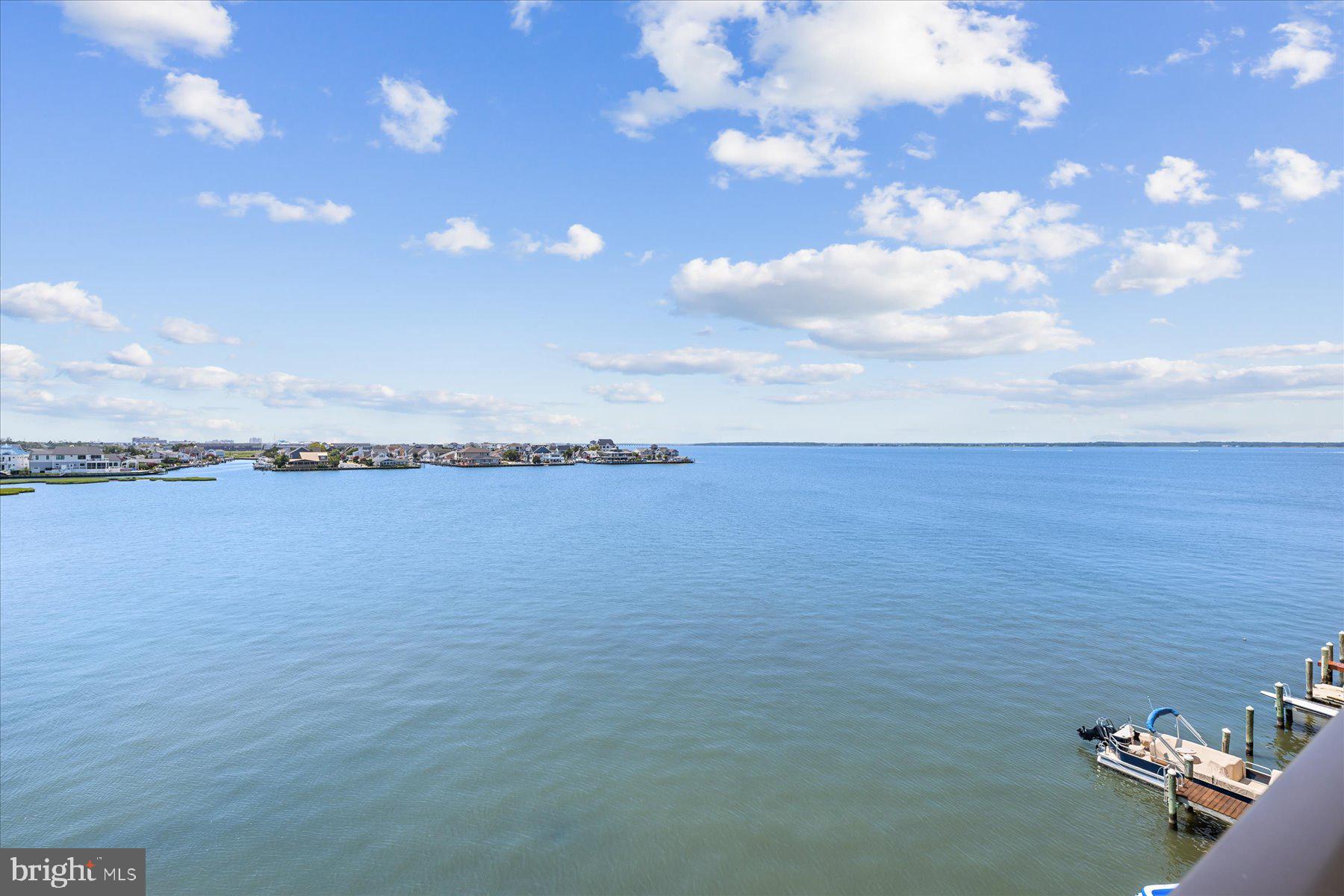 169 Jamestown Road, Unit 503 Ocean City, MD 21842 - Photo 16 of 18 a view of a terrace with sky view