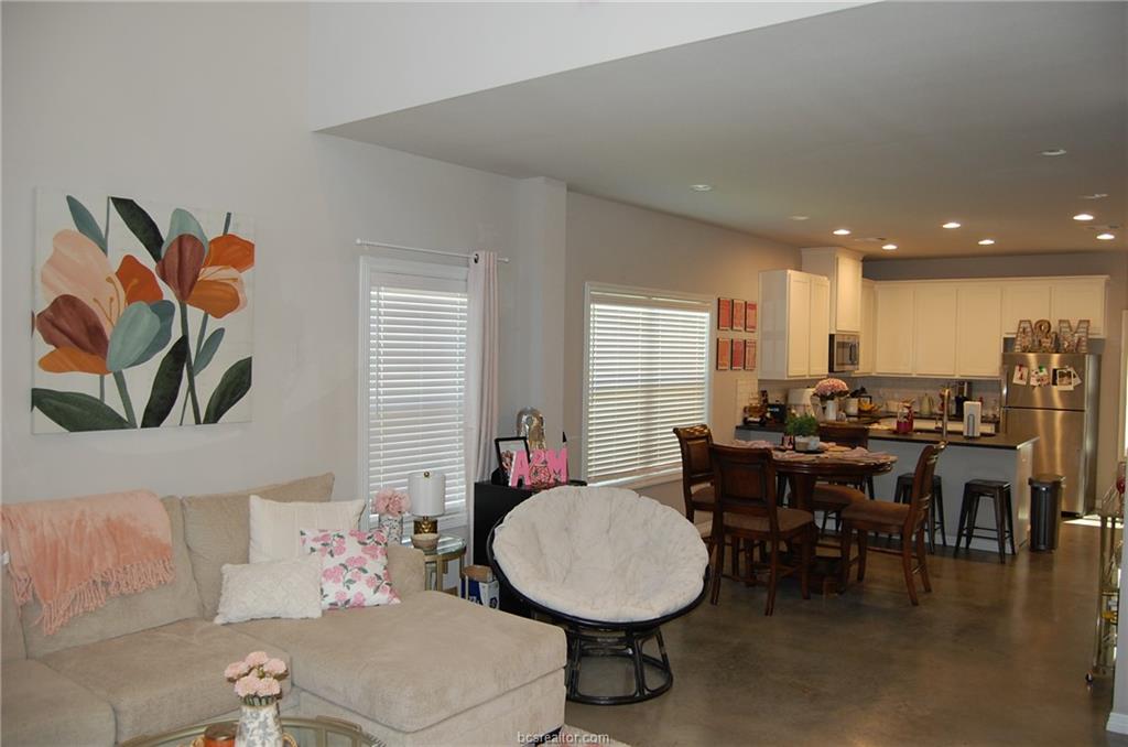 3102 Green Street Bryan, TX 77801 - Photo 3 of 26 a view of a dining room with furniture window and wooden floor