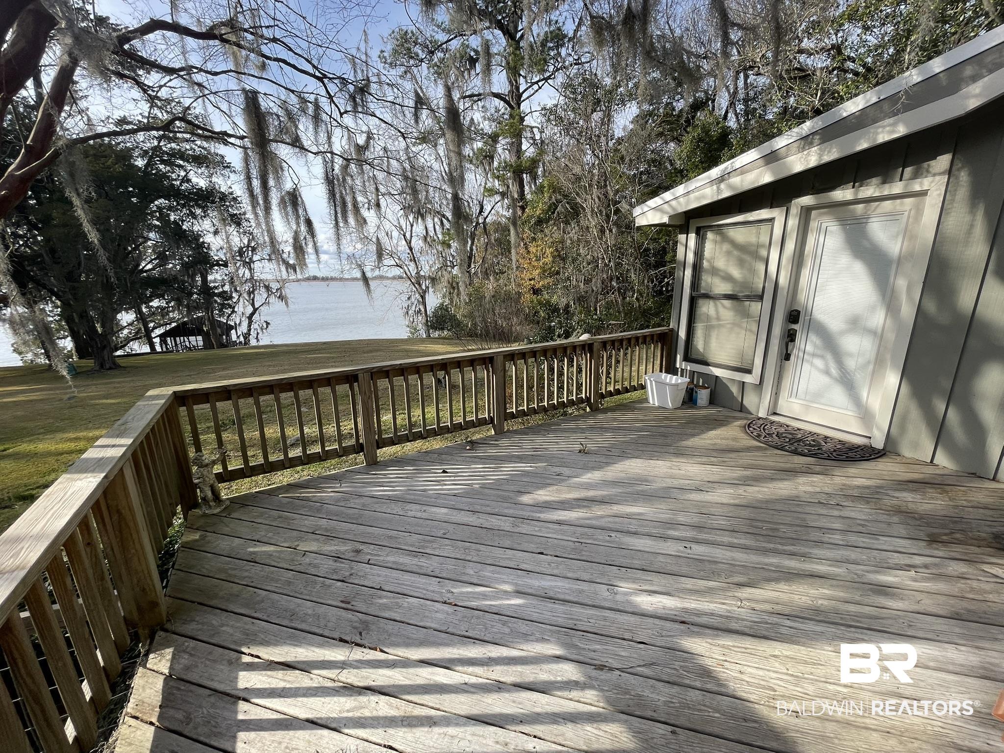 6621 Purvis Road Daphne, AL 36527 - Photo 7 of 59 Wooden deck with a water view