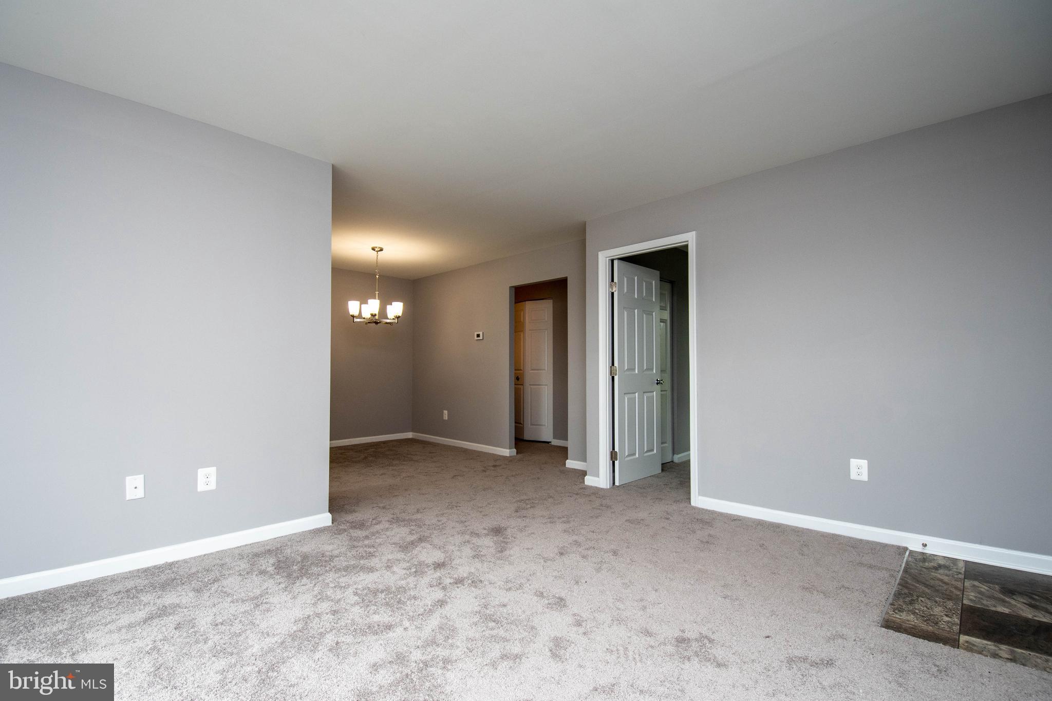 3216 Spartan Road, Unit 3E6 40) Olney, MD 20832 - Photo 4 of 35 Living room looking toward DR, 1st bdrm & hallway