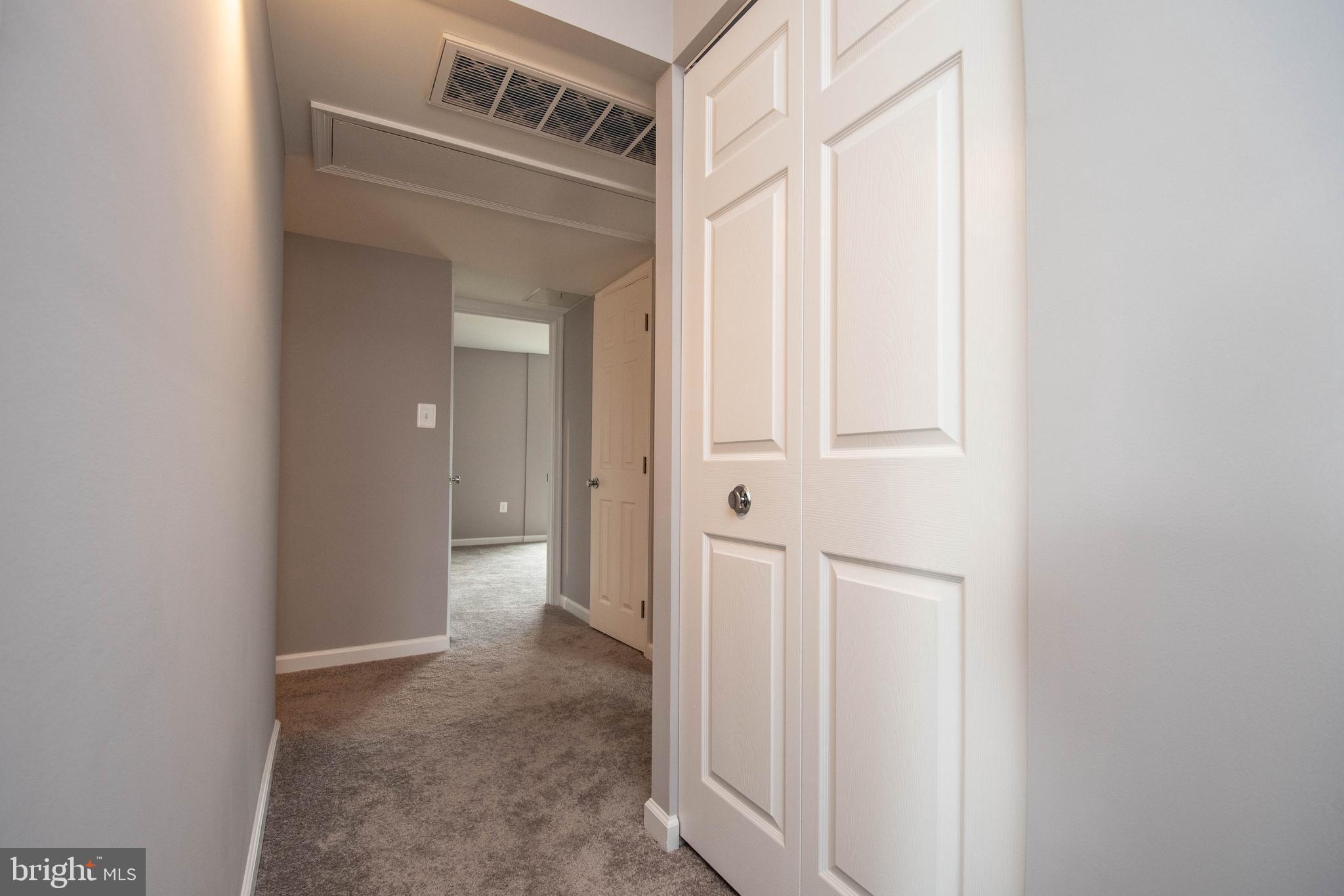 3216 Spartan Road, Unit 3E6 40) Olney, MD 20832 - Photo 31 of 35 Hallway view toward Living areas w/linen closet