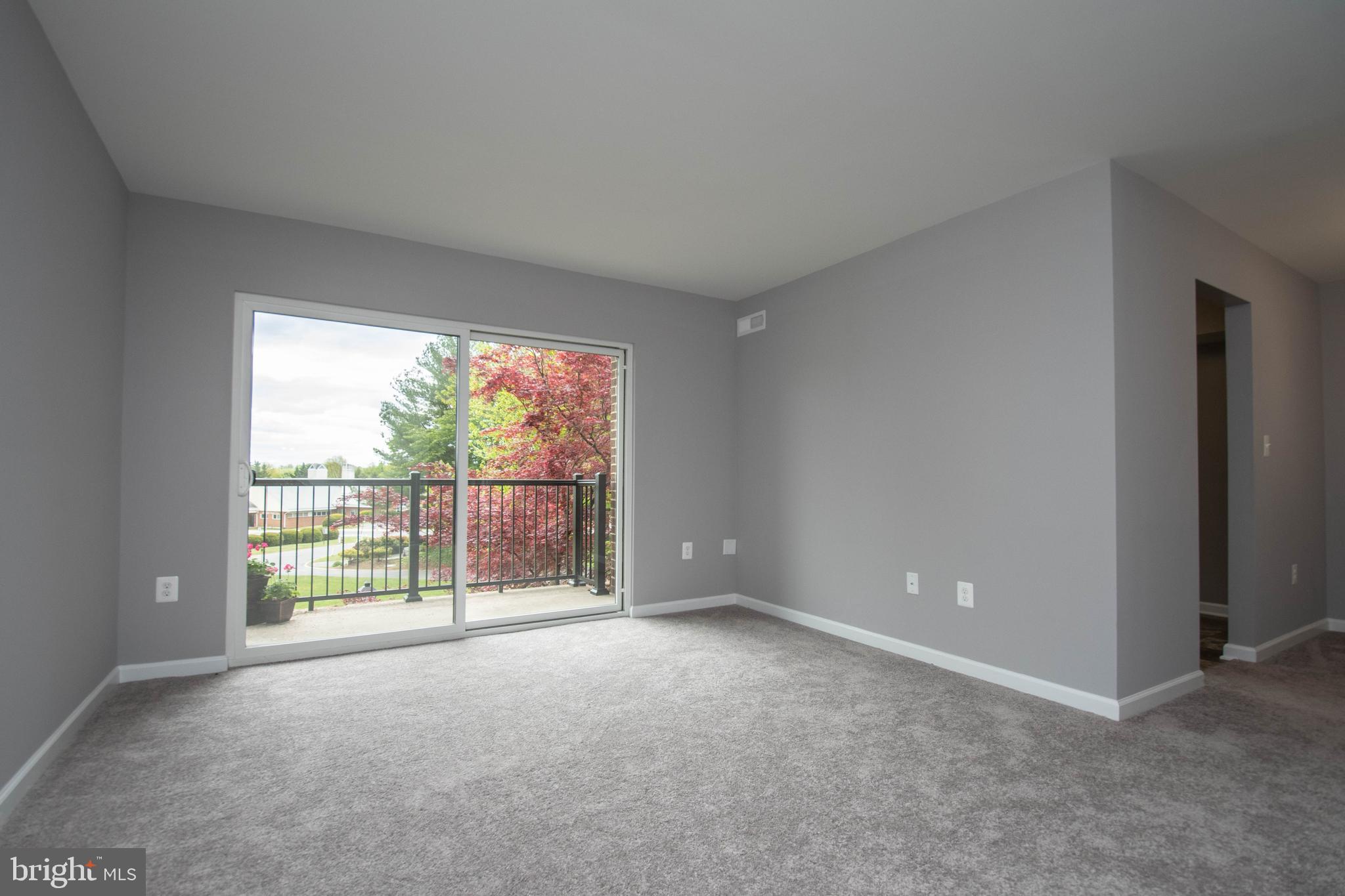 3216 Spartan Road, Unit 3E6 40) Olney, MD 20832 - Photo 5 of 35 Living Rm and balcony with wide open views