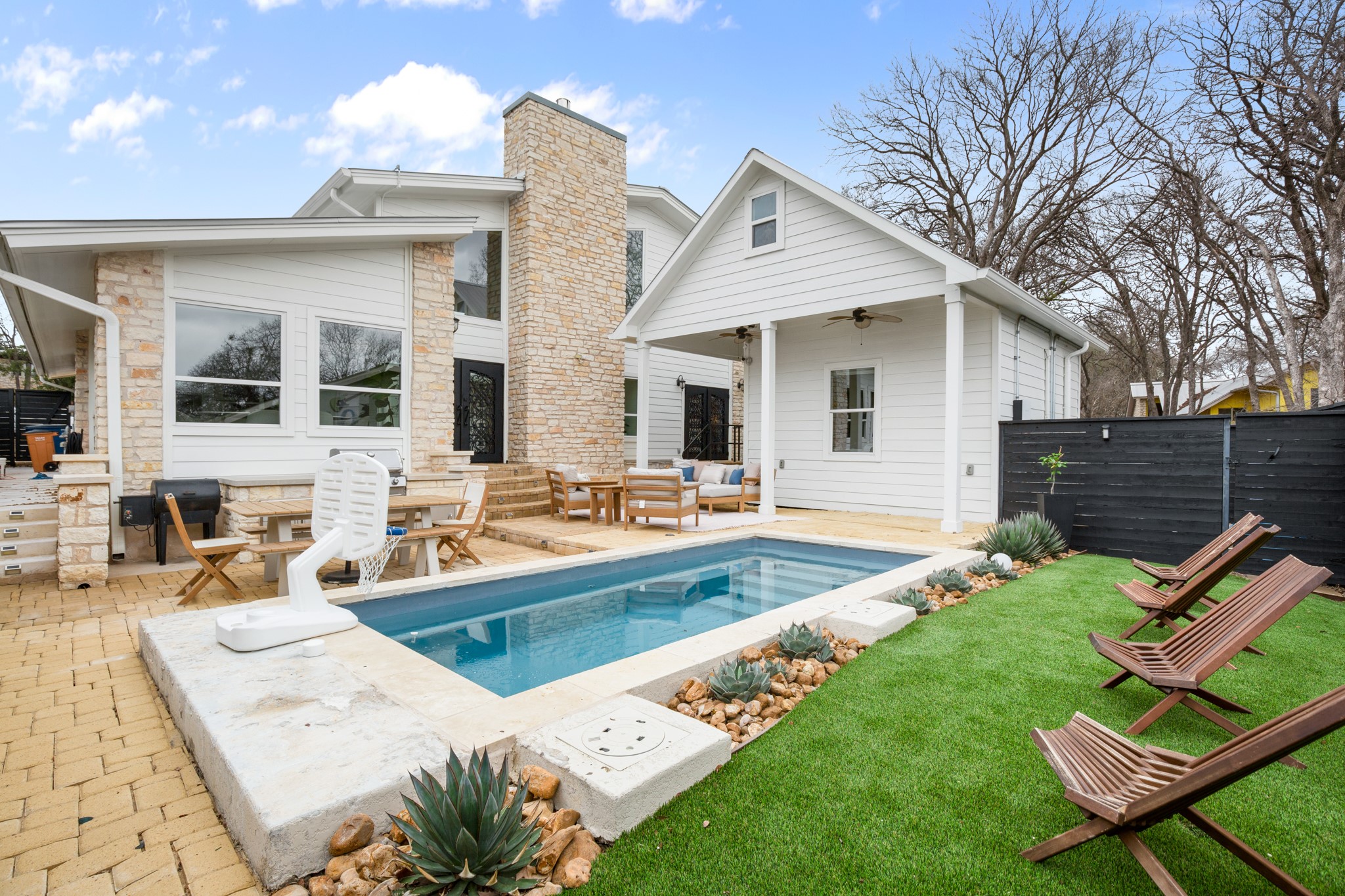 1813 Crooked Lane Austin, TX 78741 - Photo 35 of 39 a view of a house with swimming pool and sitting area