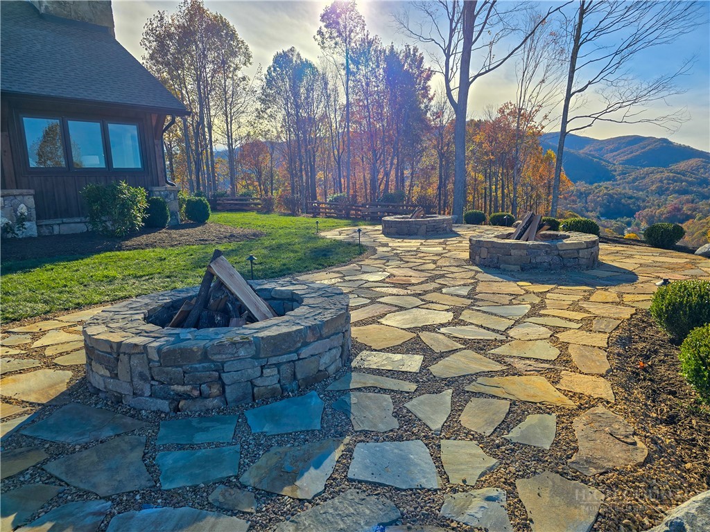 Lot 191 Raspberry Lane Elk Park, NC 28622 - Photo 10 of 12 a view of a house with backyard and sitting area