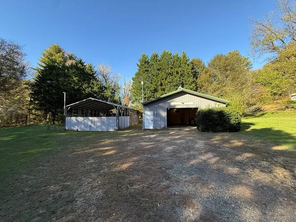 a house with trees in the background