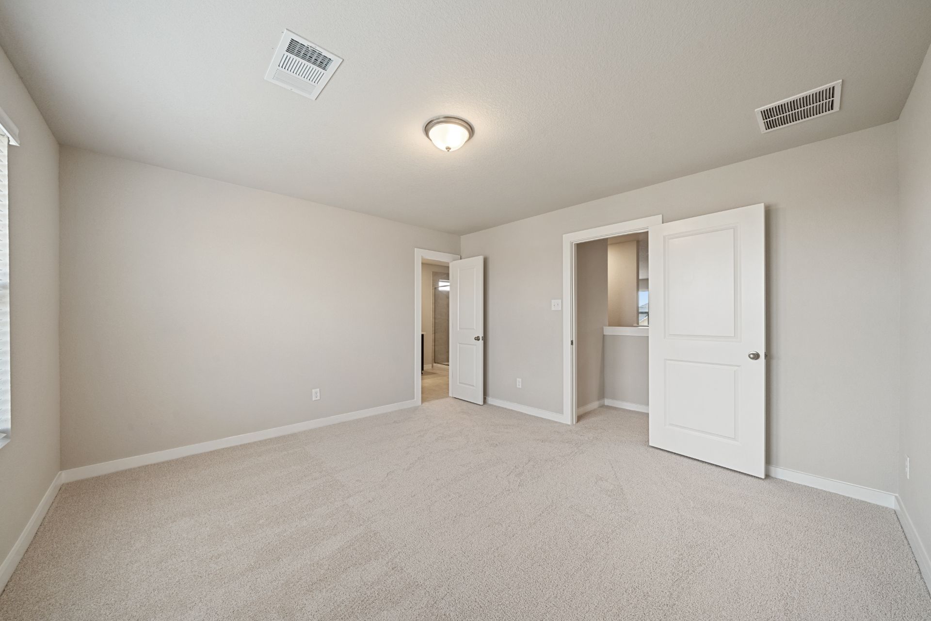 13801 Ryan Range Lane Elgin, TX 78621 - Photo 11 of 28 Primary Bedroom - Representative Photo
