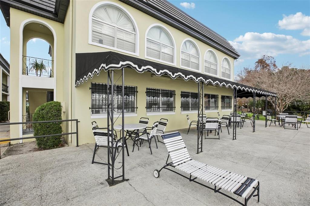 1500 Gay Road, Unit 5 Winter Park, FL 32789 - Photo 17 of 17 a view of a building with dining space and glass windows