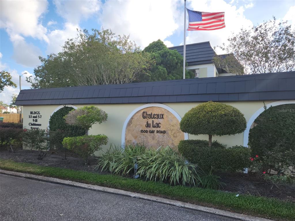 1500 Gay Road, Unit 5 Winter Park, FL 32789 - Photo 3 of 17 a view of a yard with potted plants