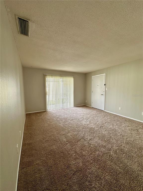 1500 Gay Road, Unit 5 Winter Park, FL 32789 - Photo 9 of 17 an empty room with windows