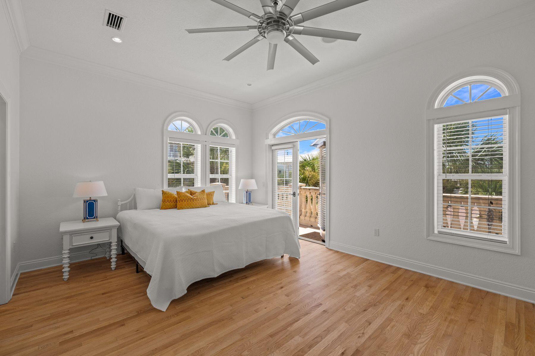 428 Beach Bike Way Seacrest, FL 32461 - Photo 17 of 32 a bedroom with a bed and a large window