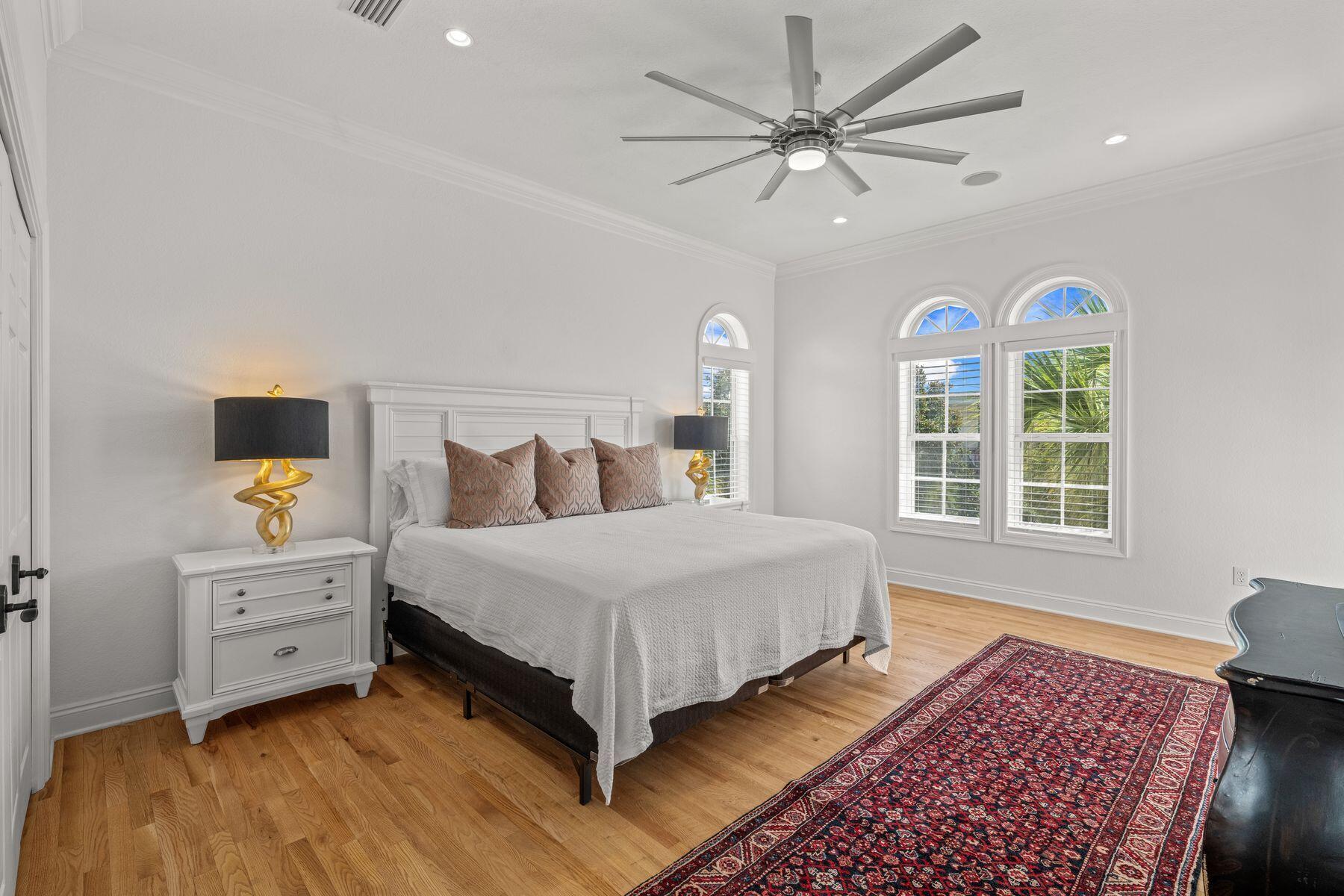 428 Beach Bike Way Seacrest, FL 32461 - Photo 18 of 32 a spacious bedroom with a bed and a window