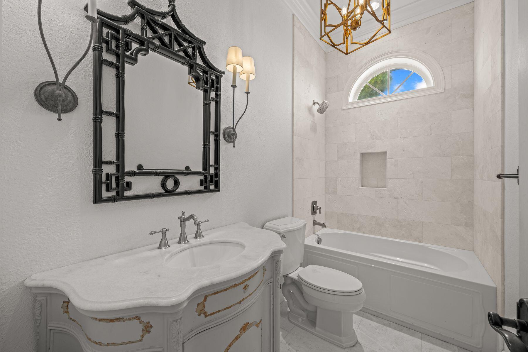 428 Beach Bike Way Seacrest, FL 32461 - Photo 20 of 32 a bathroom with a granite countertop sink toilet and a mirror