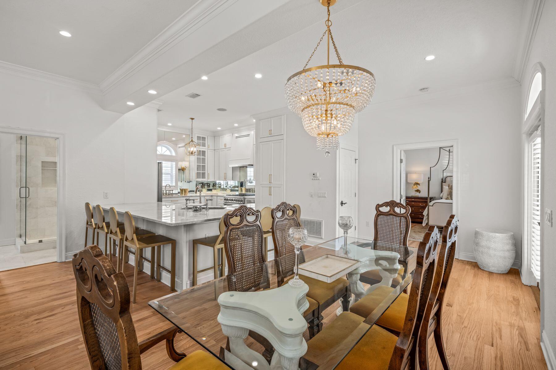 428 Beach Bike Way Seacrest, FL 32461 - Photo 7 of 32 a view of a dining room with furniture and wooden floor