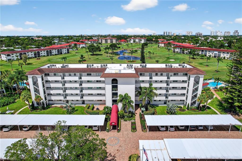 29 High Point Circle East, Unit 204 Naples, FL 34103 - Photo 28 of 29 a view of a city