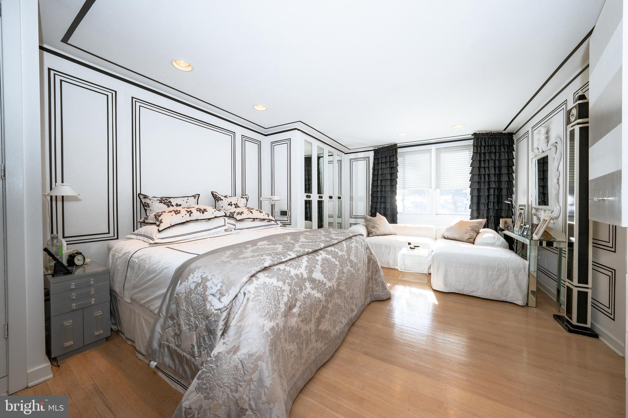 1335 Valley Road Villanova, PA 19085 - Photo 18 of 27 a spacious bedroom with a bed and a large window