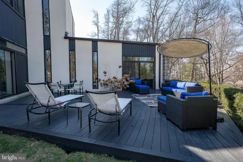 a view of a patio with furniture