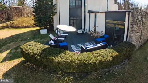a view of a chairs in front of house