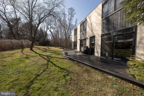 a view of a backyard with a small cabin