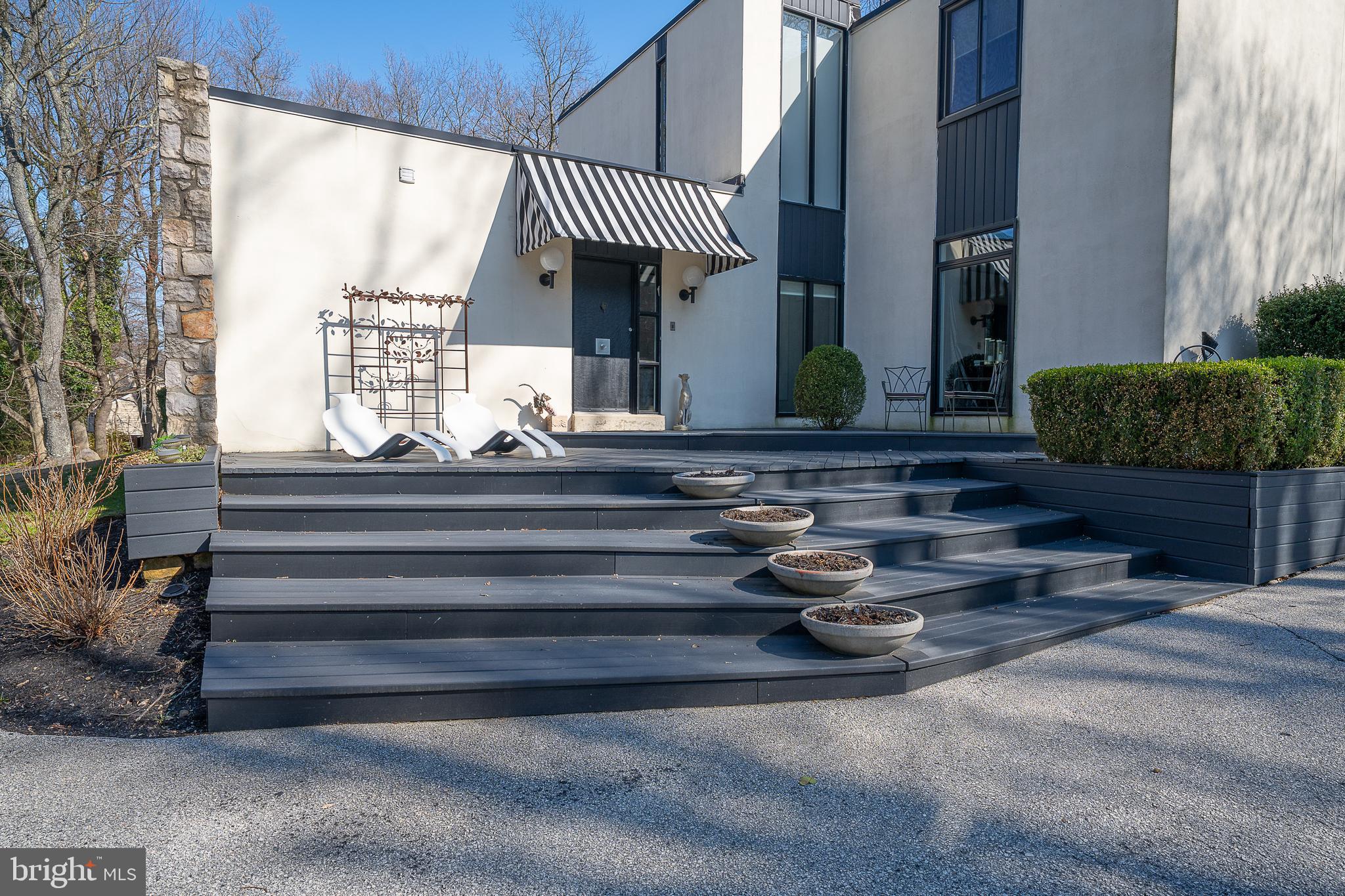 1335 Valley Road Villanova, PA 19085 - Photo 3 of 27 a bathroom with a sink and a mirror