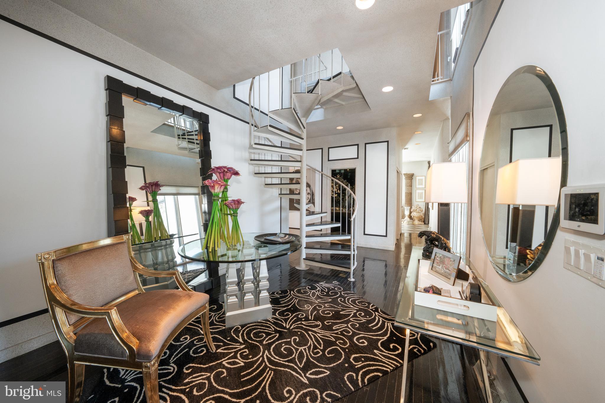 1335 Valley Road Villanova, PA 19085 - Photo 5 of 27 a view of a dining room with furniture and a chandelier