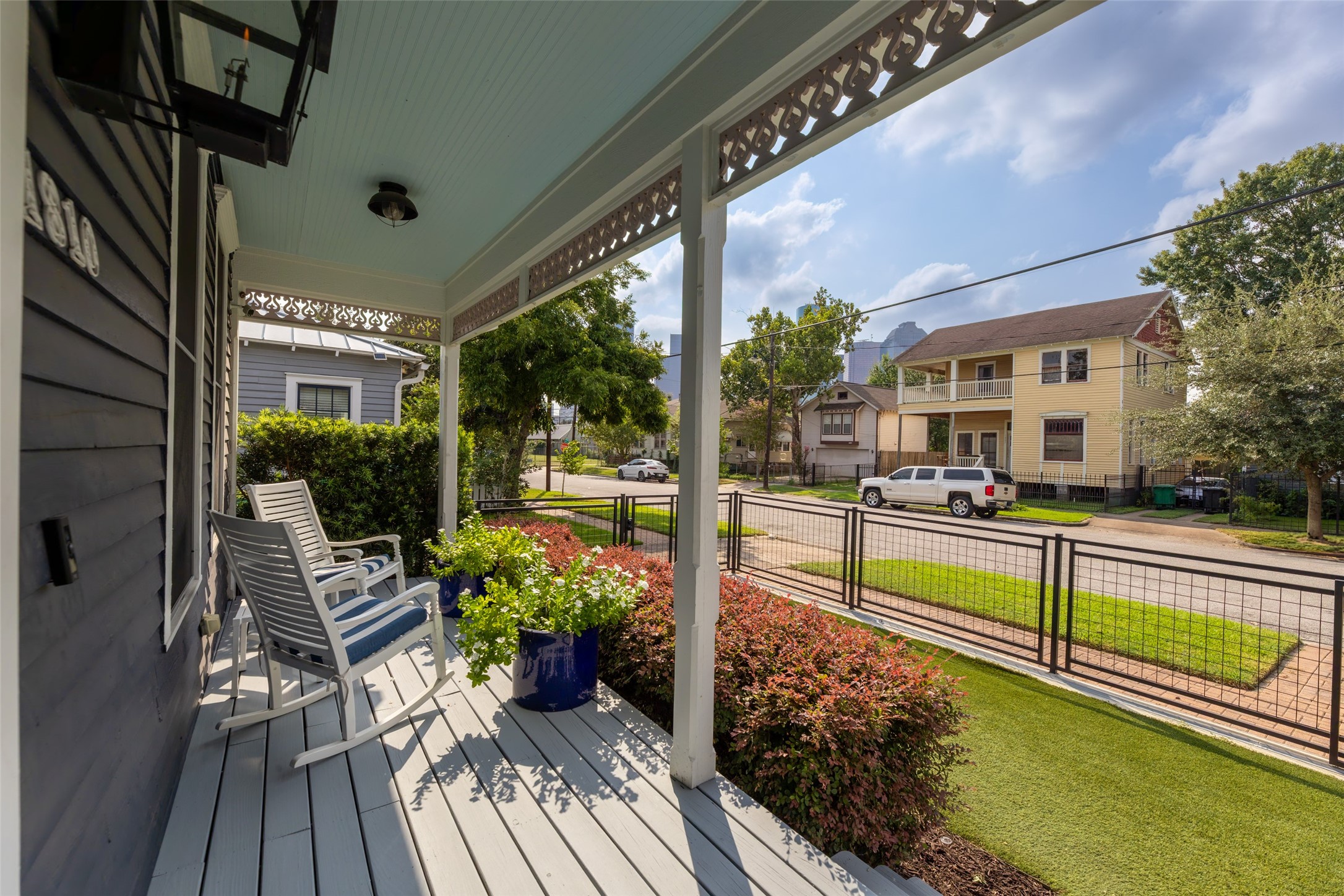 a view of a house with swimming pool and sitting area