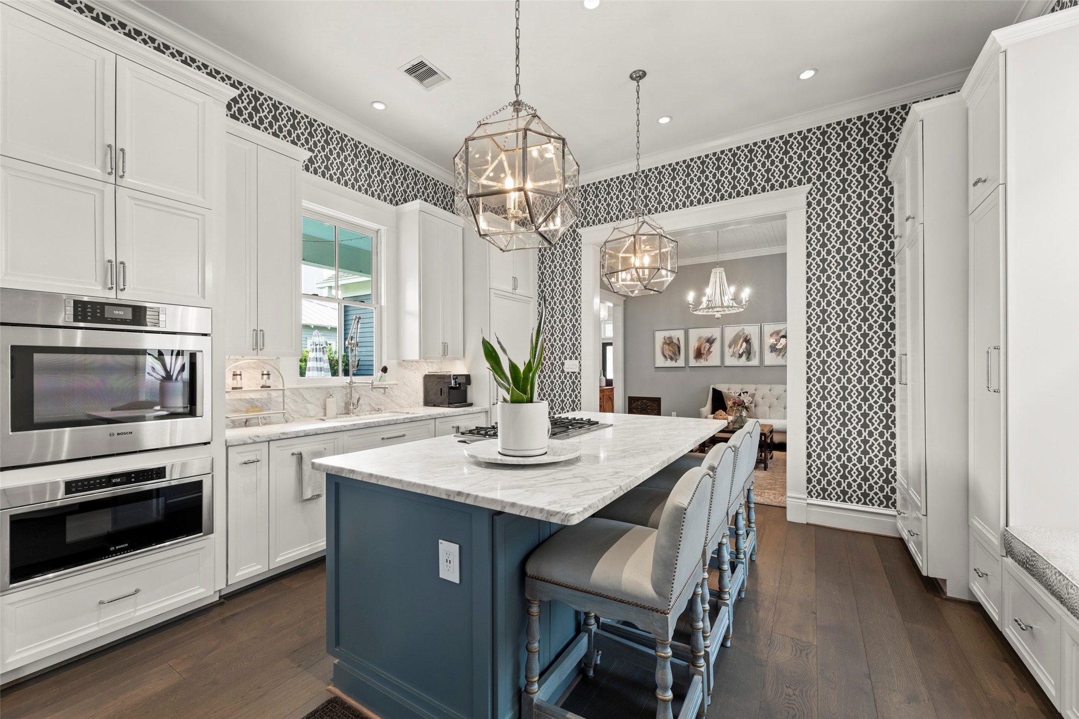 1810 Kane Street Houston, TX 77007 - Photo 15 of 47 a kitchen with stainless steel appliances granite countertop a kitchen island hardwood floor sink and stove