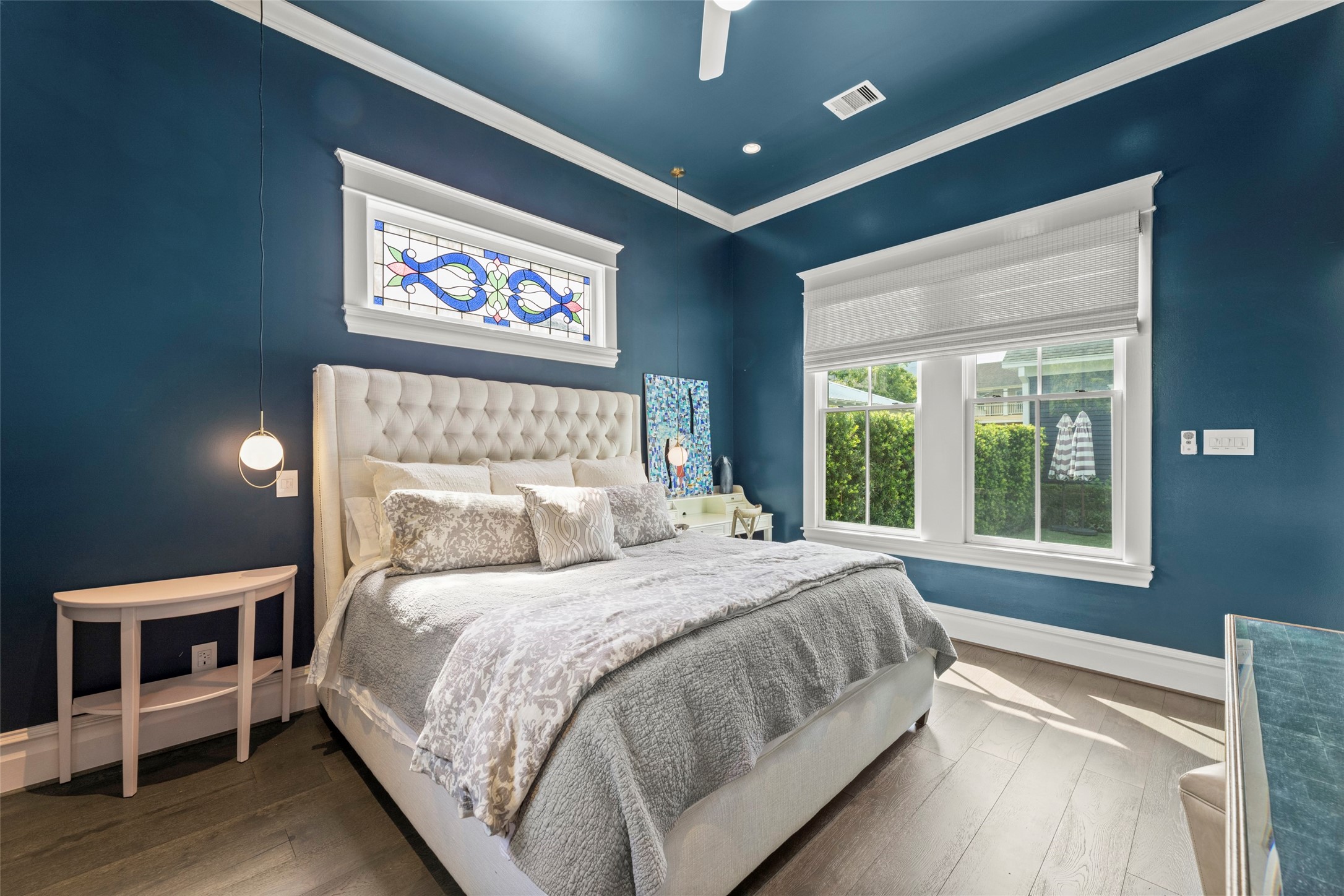 1810 Kane Street Houston, TX 77007 - Photo 24 of 47 a bedroom with a bed and a large window