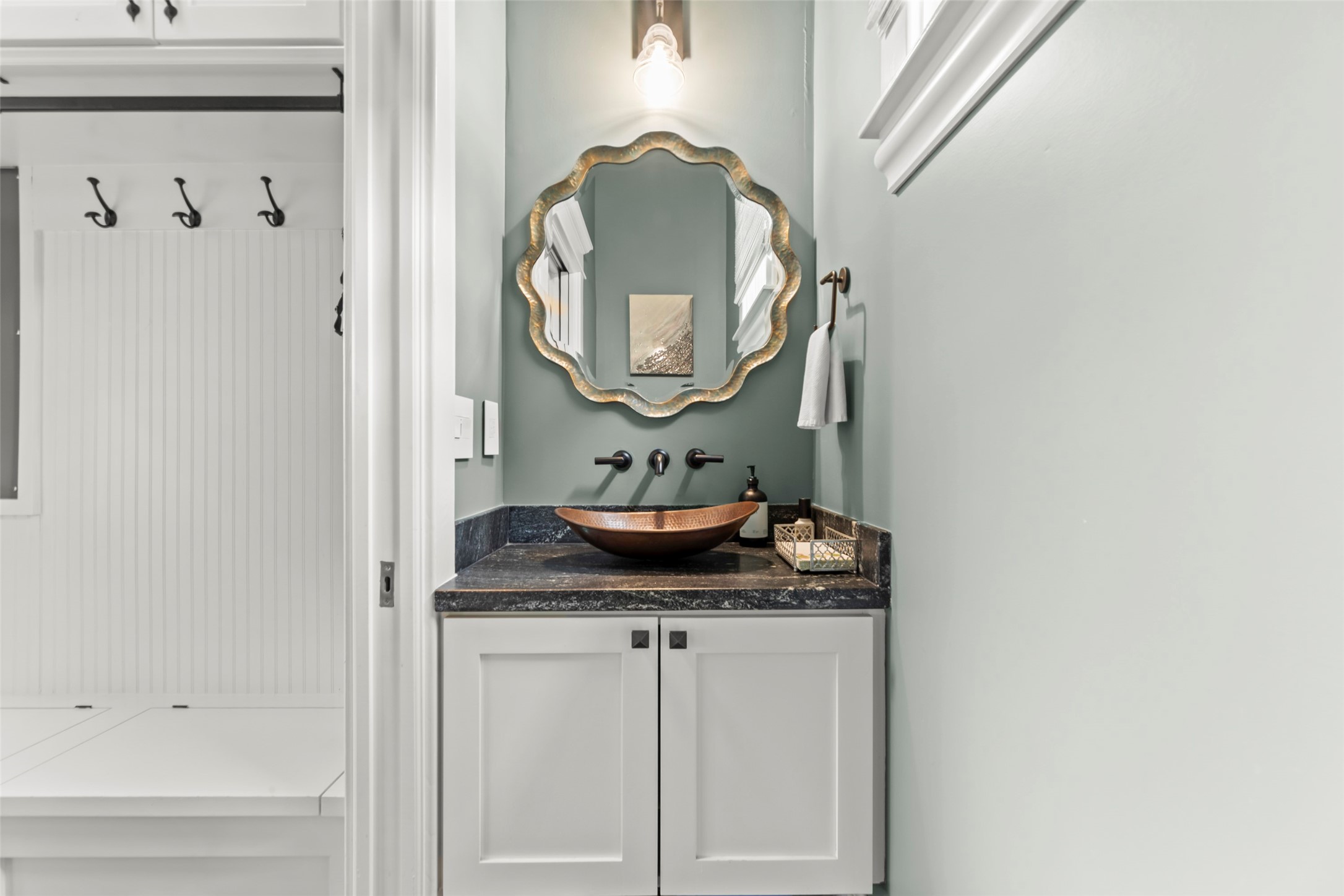 1810 Kane Street Houston, TX 77007 - Photo 34 of 47 a bathroom with a sink and a mirror