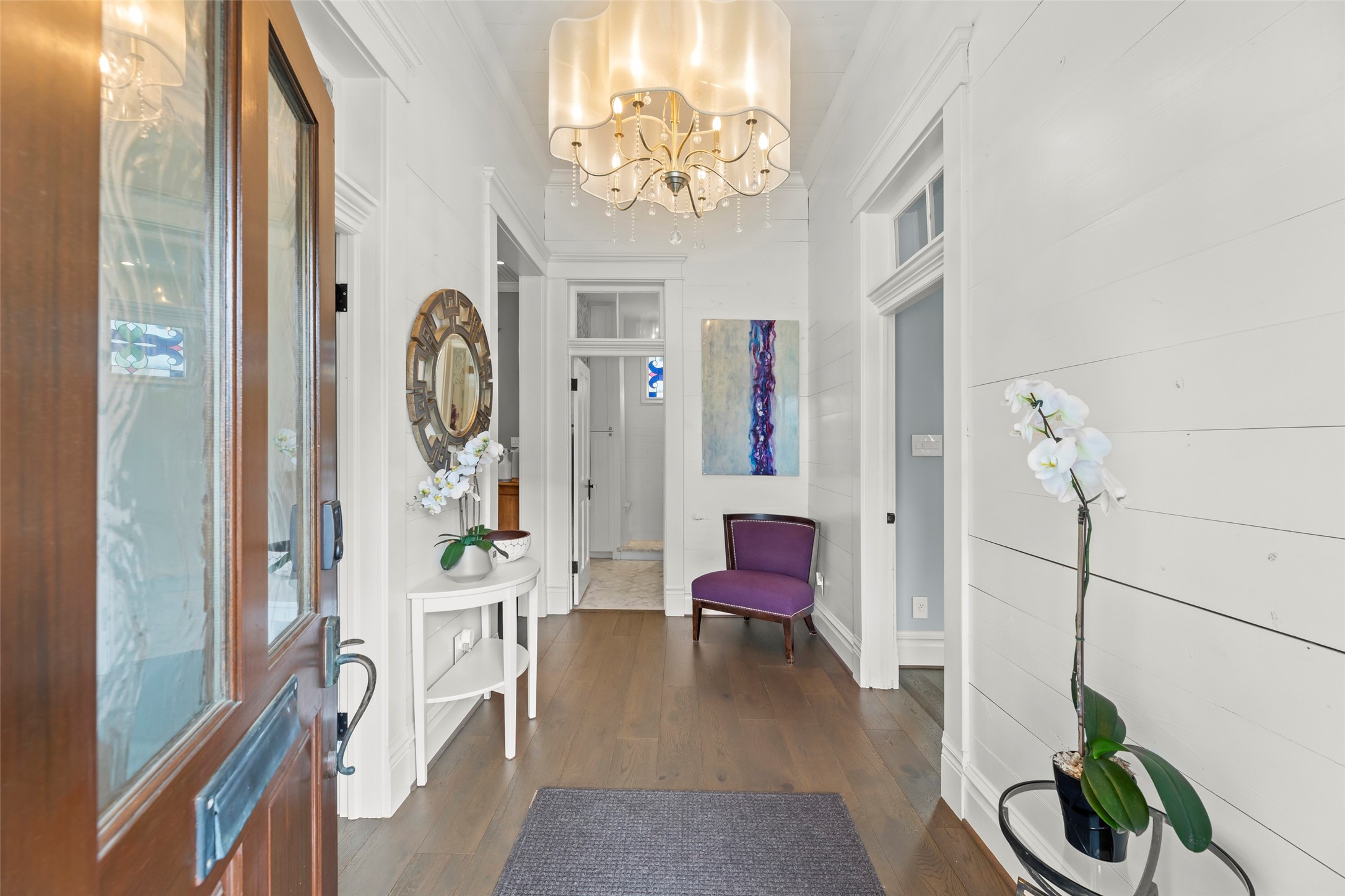 1810 Kane Street Houston, TX 77007 - Photo 4 of 47 a living room with furniture and a chandelier