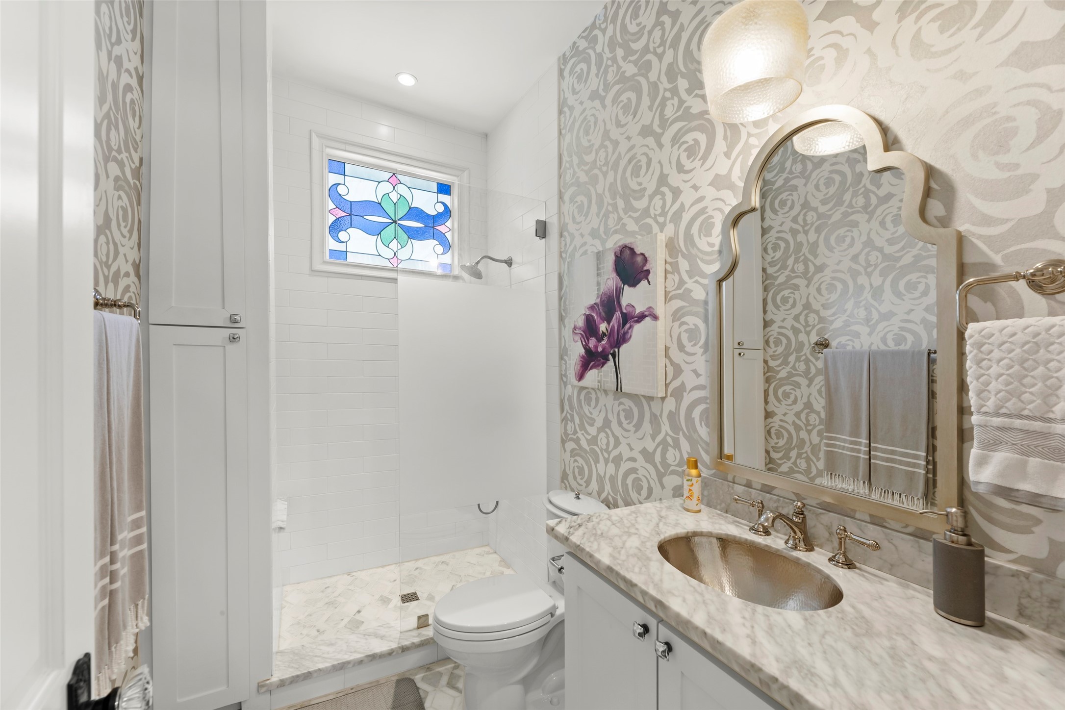 1810 Kane Street Houston, TX 77007 - Photo 8 of 47 a bathroom with a granite countertop sink a toilet and a shower