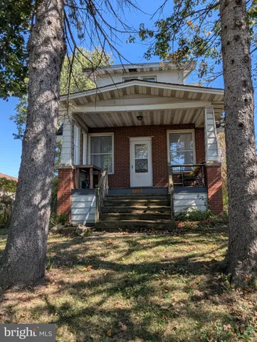 a view of a building with a tree