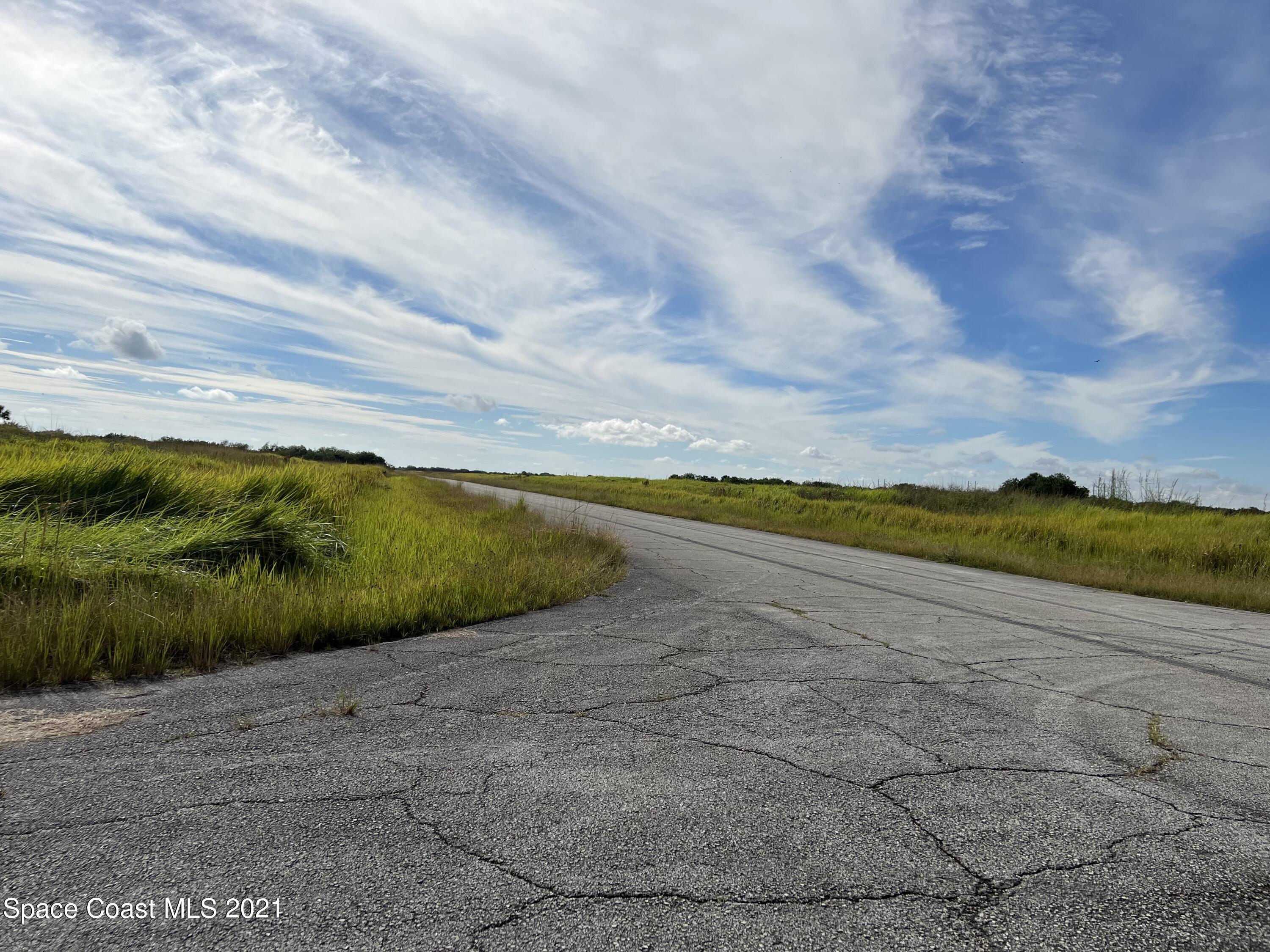 1210 Roland Street Southwest Palm Bay, FL 32908 - Photo 7 of 7 a view of an ocean and beach