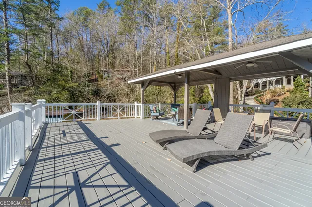 a view of a patio with couches table and chairs