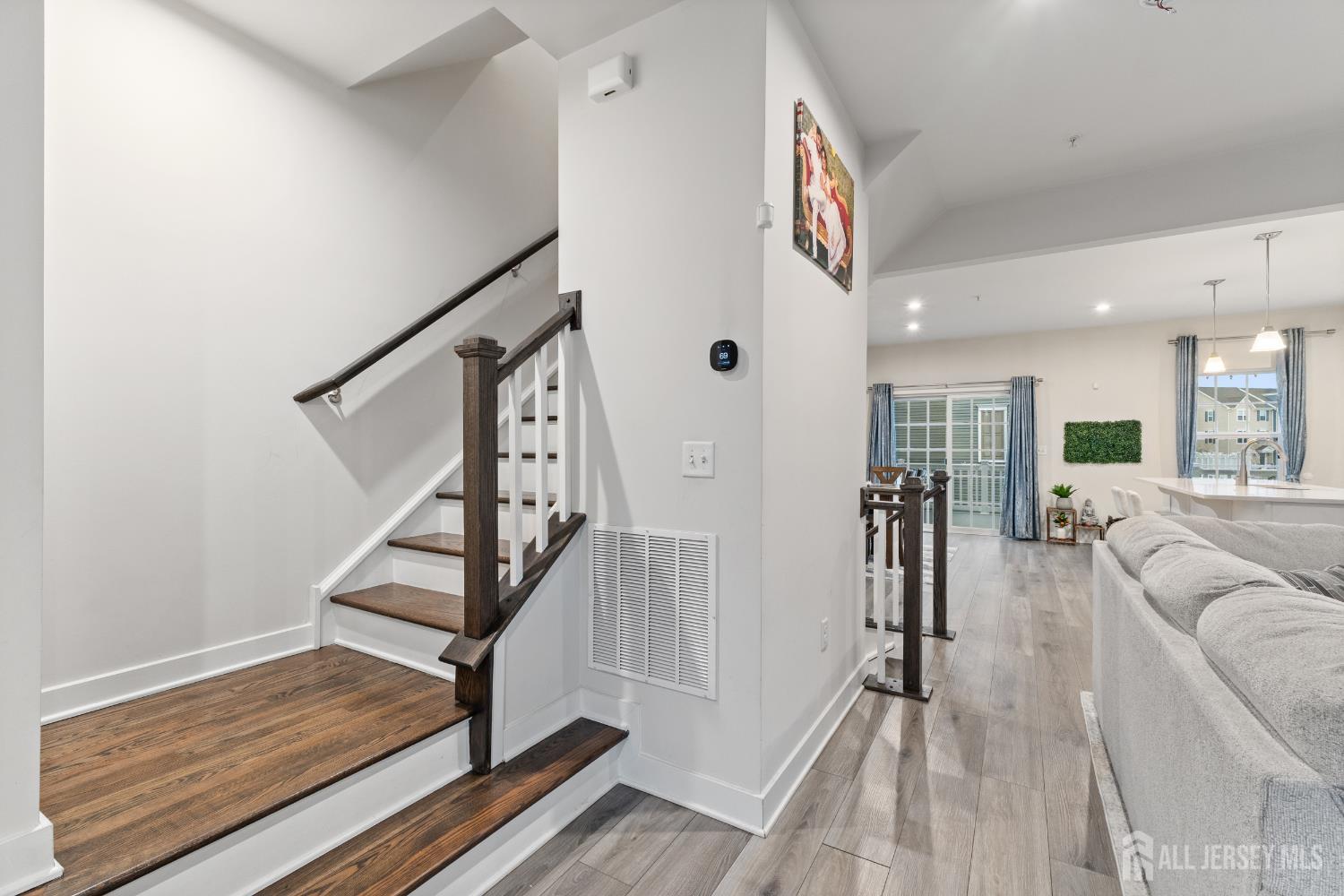 74 Anchor Way Cliffwood, NJ 07721 - Photo 15 of 35 a view of entryway and hall with wooden floor