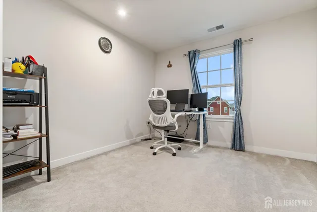 a balcony with furniture and wooden floor