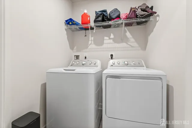 an aerial view of a house with a swimming pool