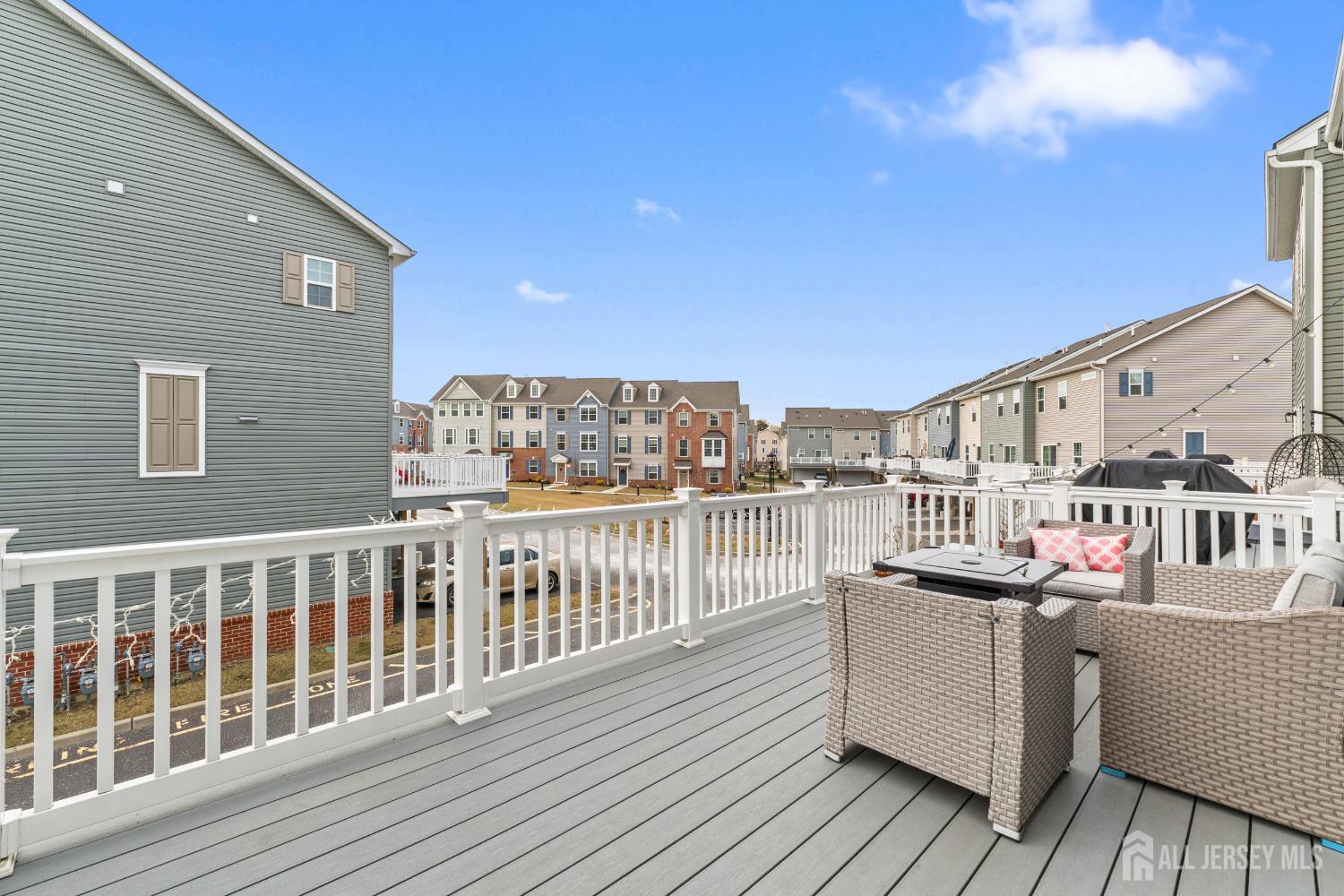 74 Anchor Way Cliffwood, NJ 07721 - Photo 27 of 35 a view of a balcony with wooden floor and fence