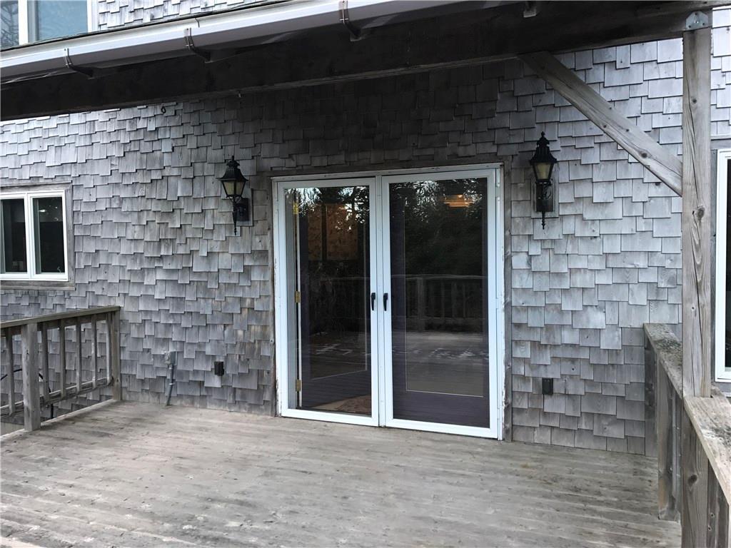 Two tiered deck with sliding glass...