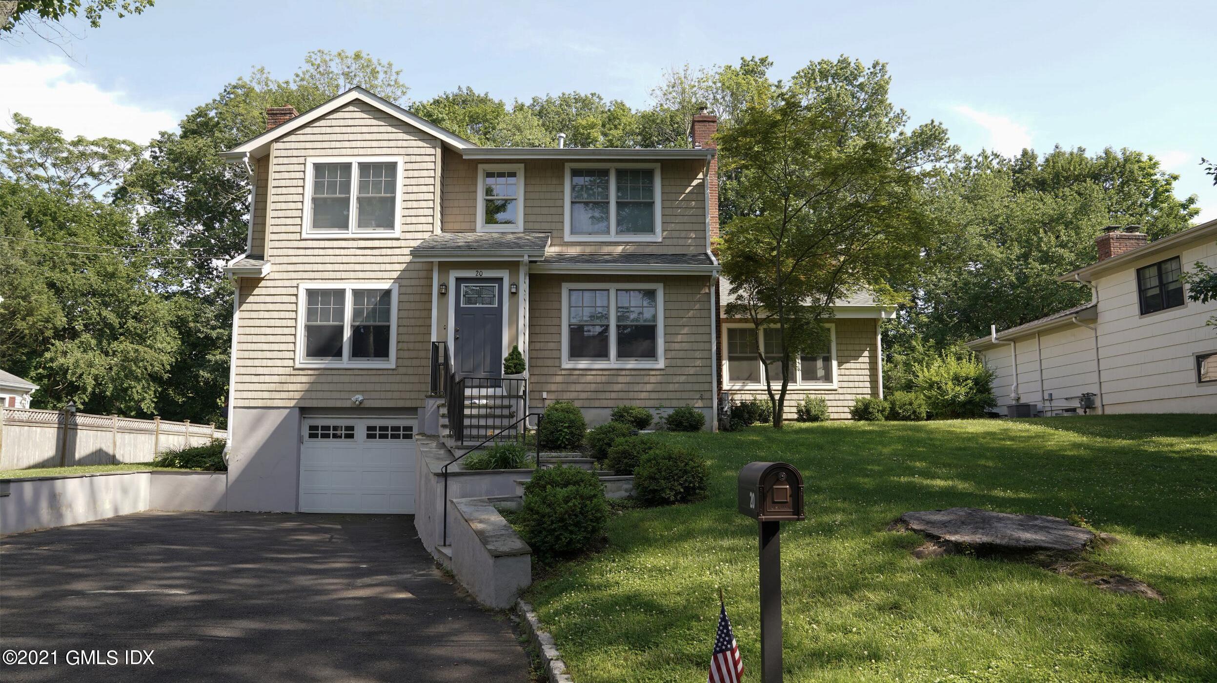 20 Sunshine Avenue Riverside, CT 06878 - Photo 1 of 39 a front view of a house with garden