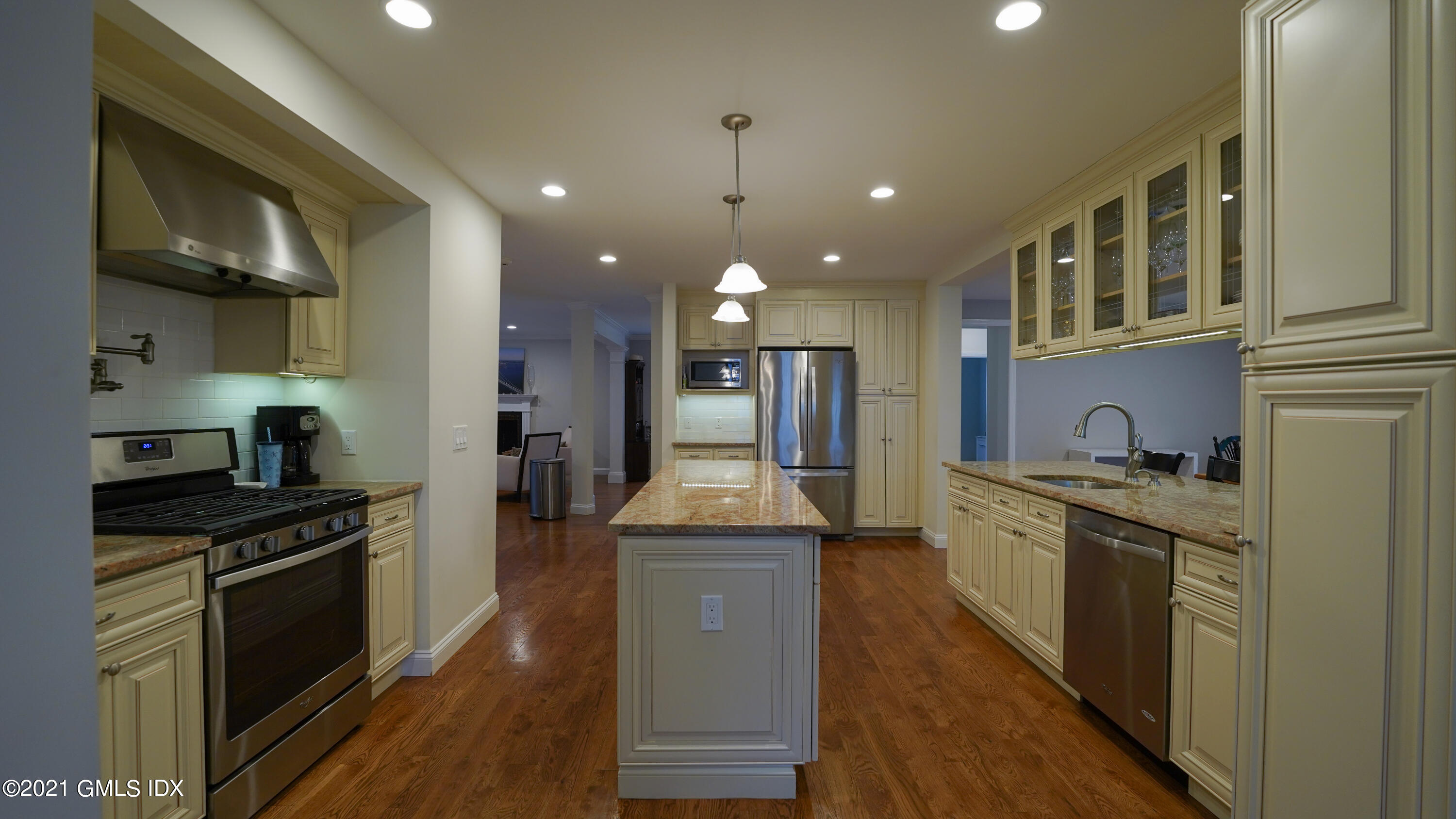 20 Sunshine Avenue Riverside, CT 06878 - Photo 11 of 39 a kitchen with stainless steel appliances granite countertop a stove a sink a refrigerator and cabinets