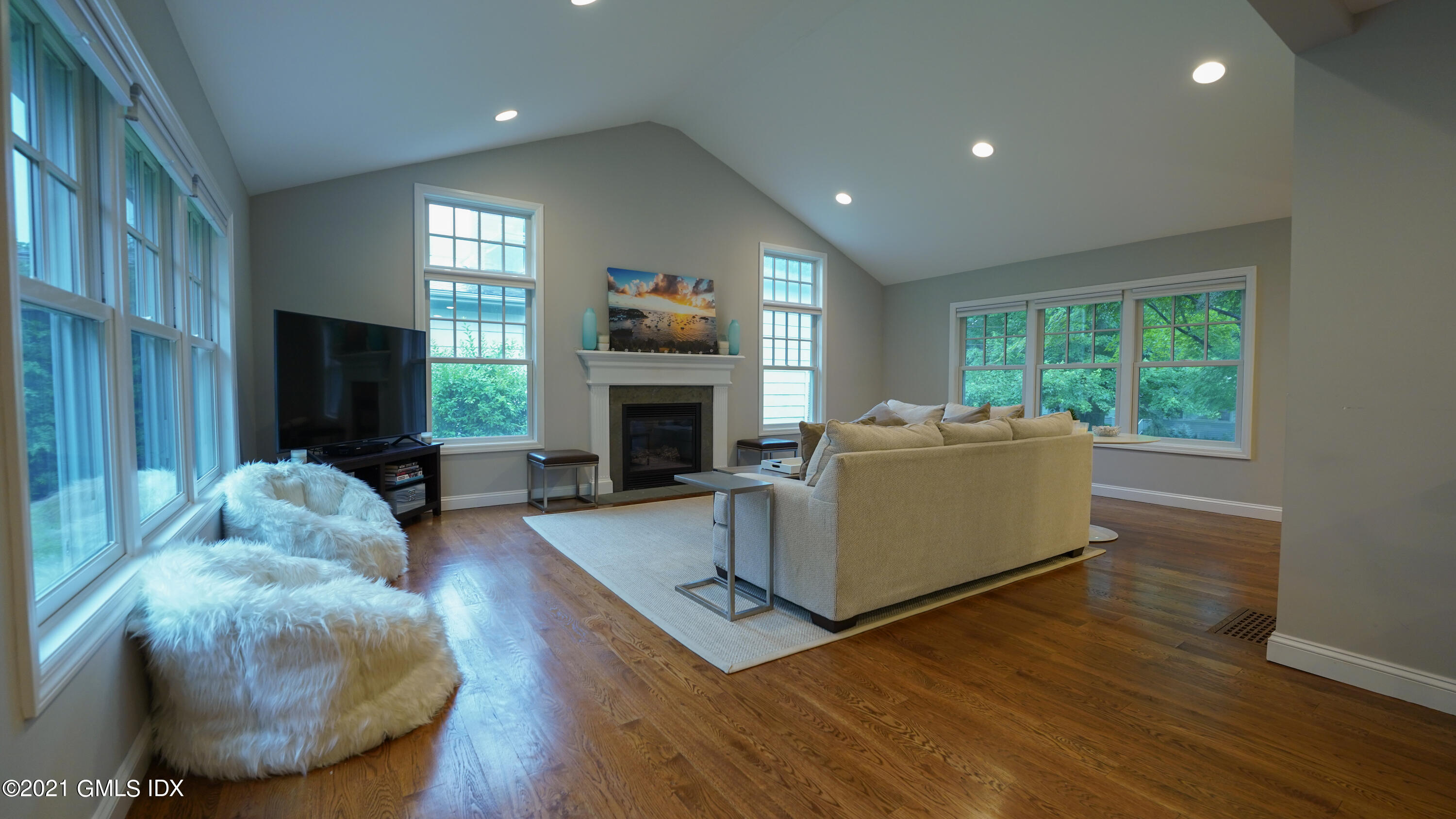 20 Sunshine Avenue Riverside, CT 06878 - Photo 2 of 39 a living room with furniture and a fireplace