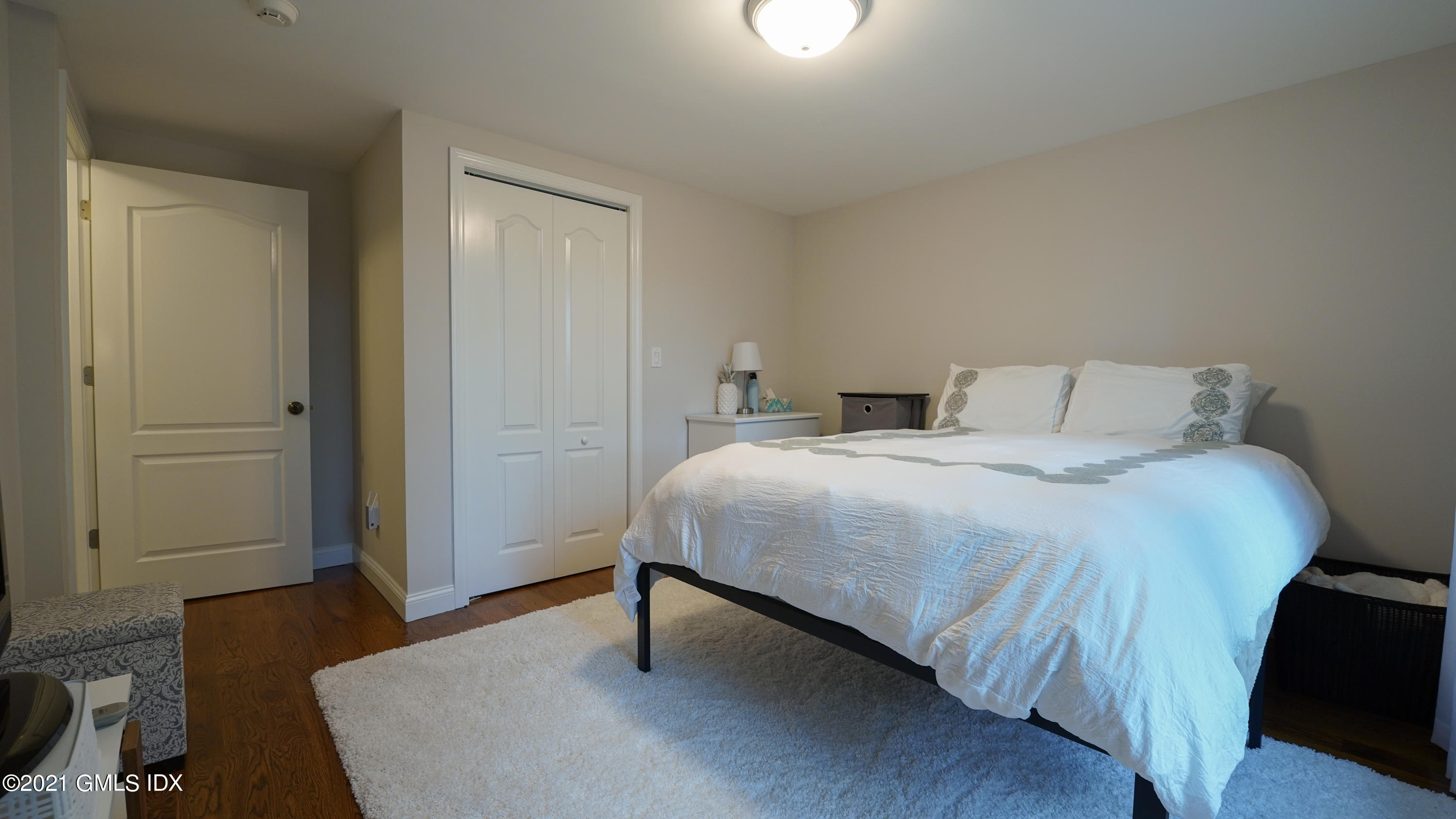 20 Sunshine Avenue Riverside, CT 06878 - Photo 23 of 39 a bedroom with a bed and a table in it