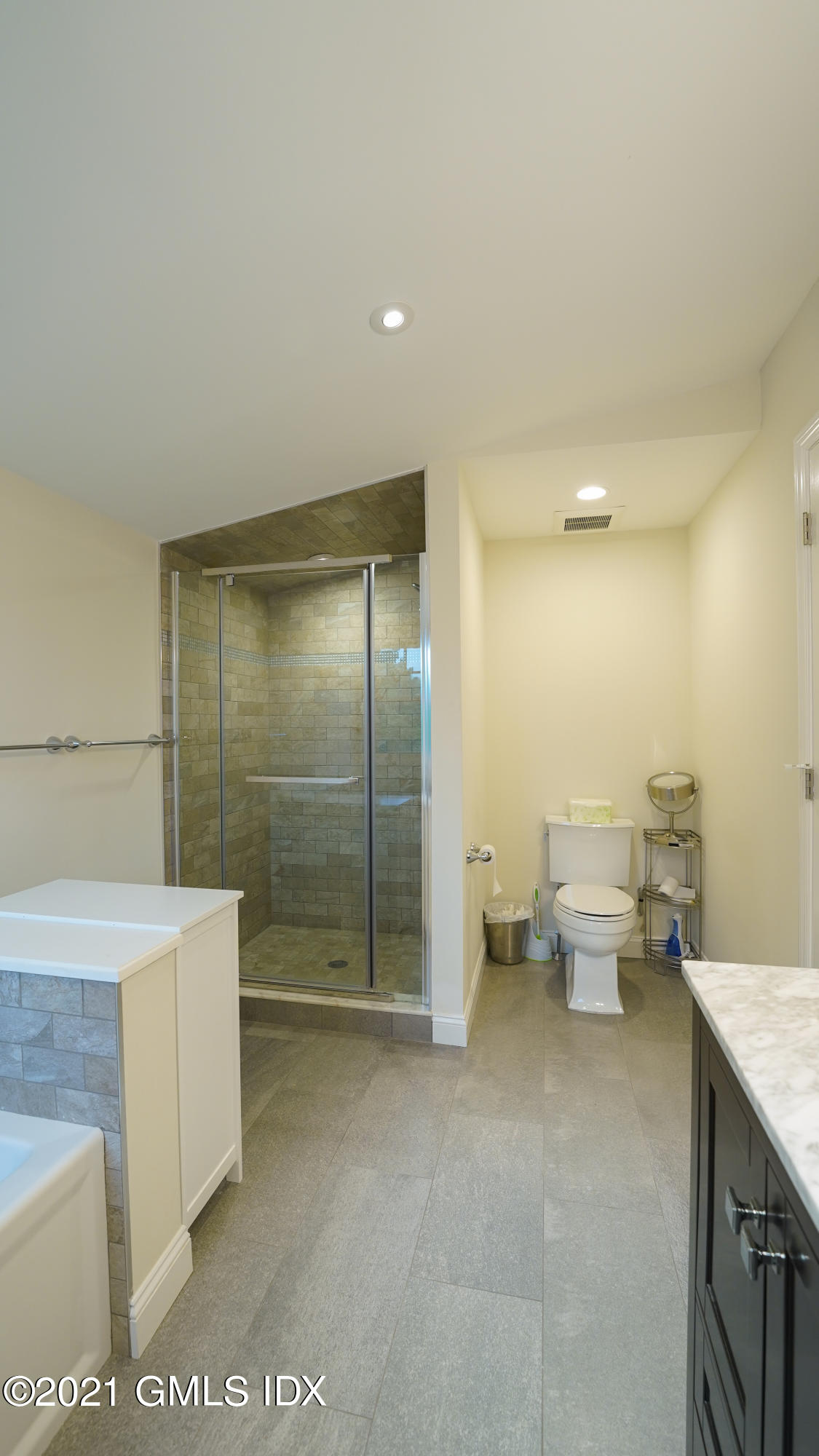 20 Sunshine Avenue Riverside, CT 06878 - Photo 26 of 39 a spacious bathroom with a toilet sink and shower