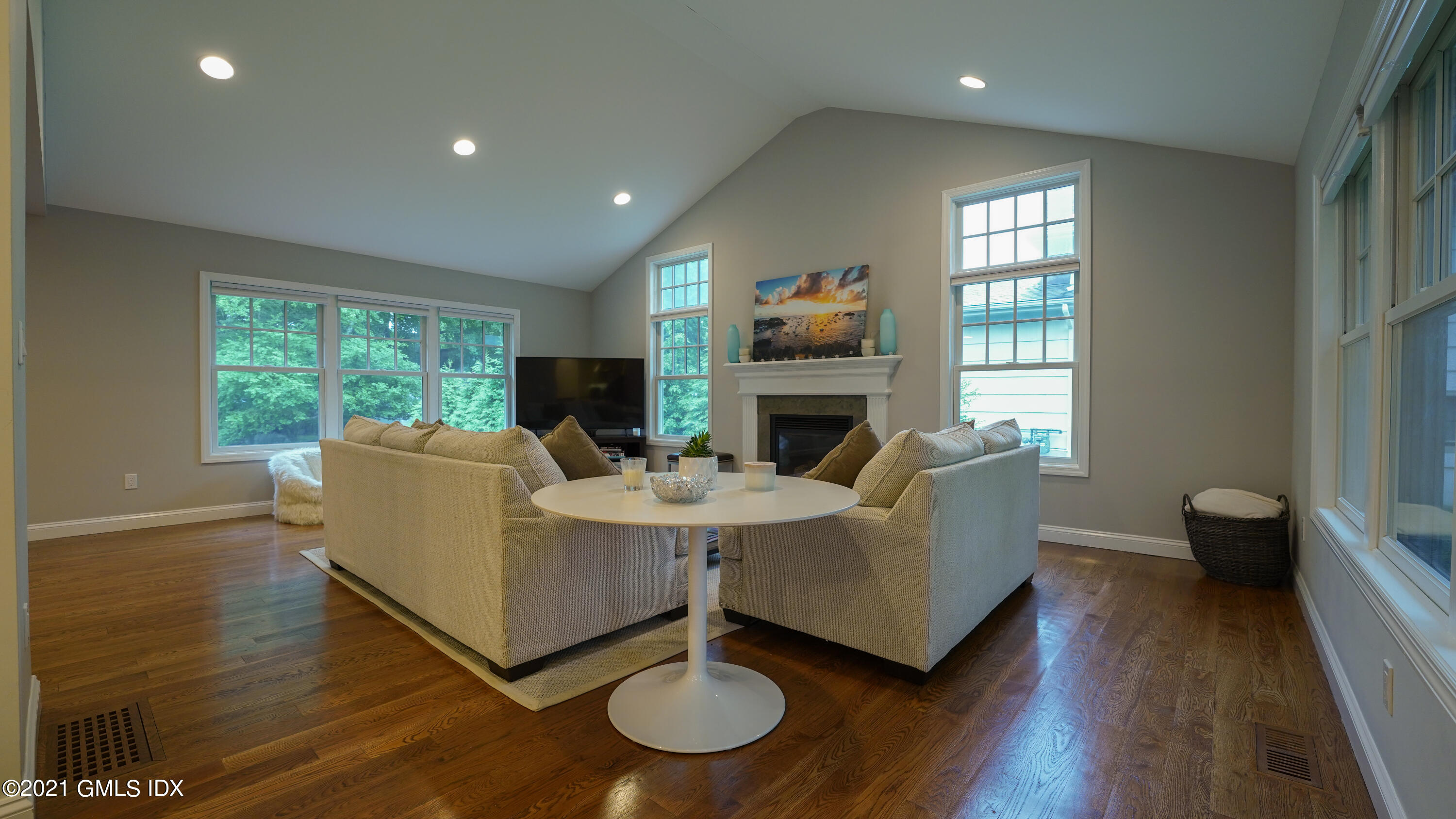 20 Sunshine Avenue Riverside, CT 06878 - Photo 3 of 39 a living room with fireplace furniture and a wooden floor