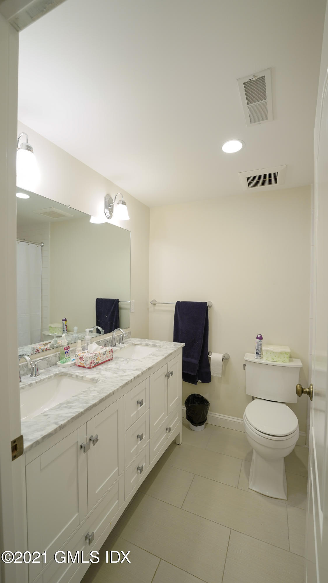20 Sunshine Avenue Riverside, CT 06878 - Photo 33 of 39 a spacious bathroom with a toilet sink and mirror